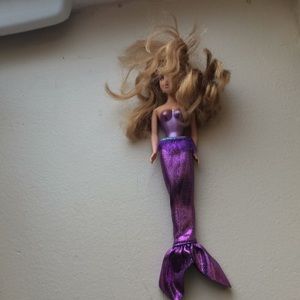 A Barbie doll mermaid